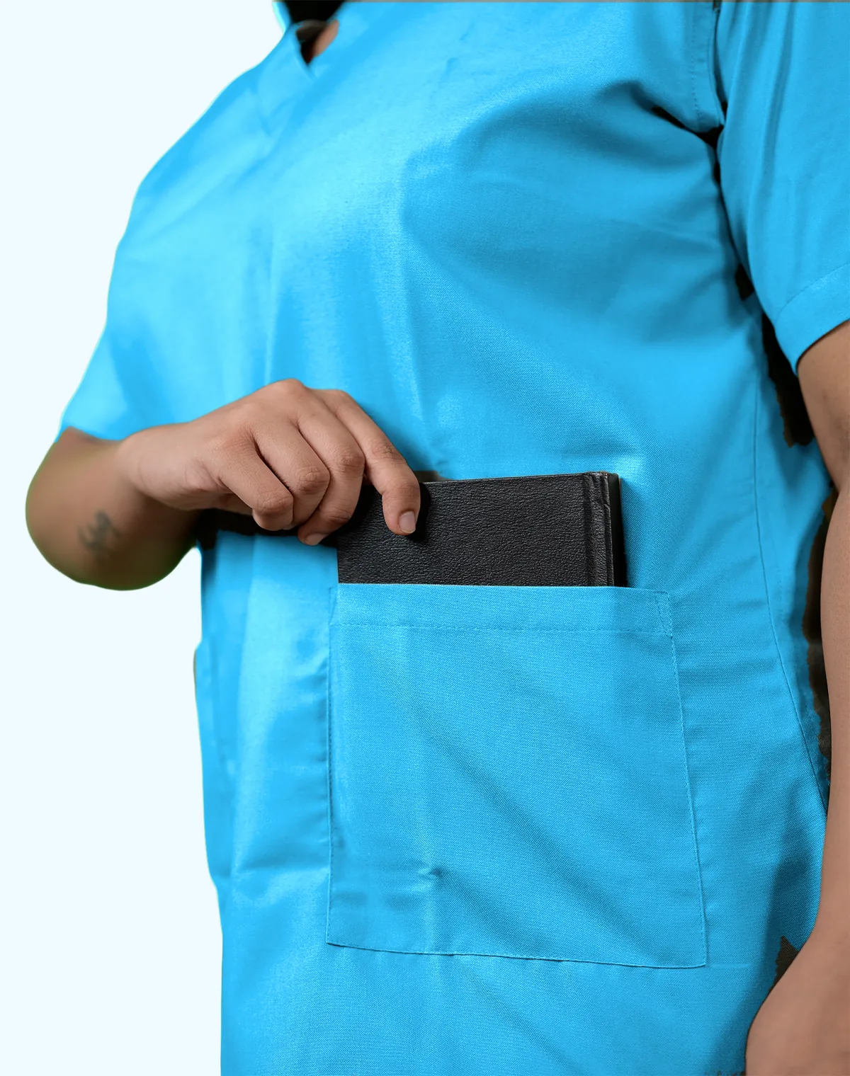 Turquoise Blue scrub suit, patch pocket detail